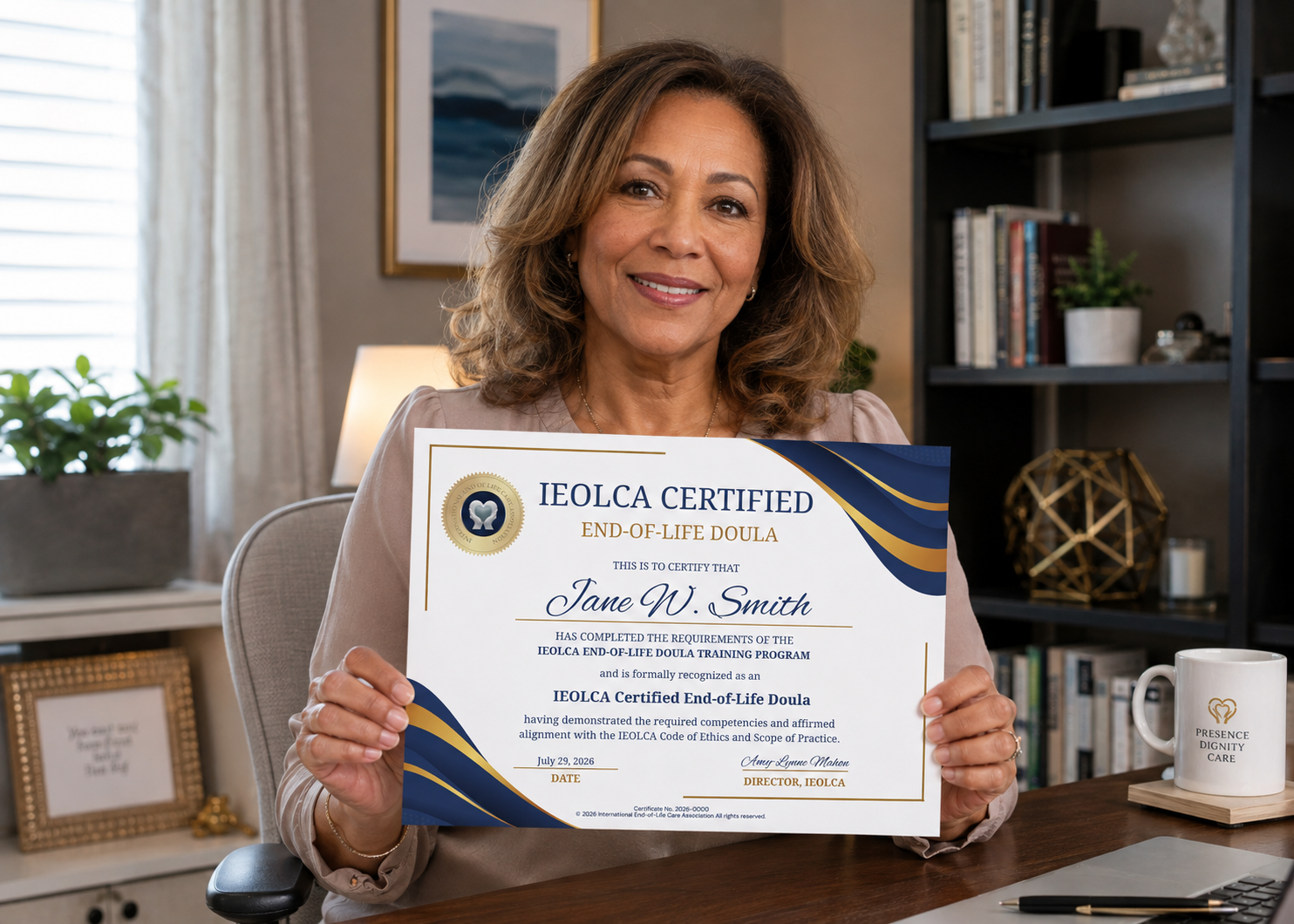 IEOLCA graduate holding her End-of-Life Doula certificate